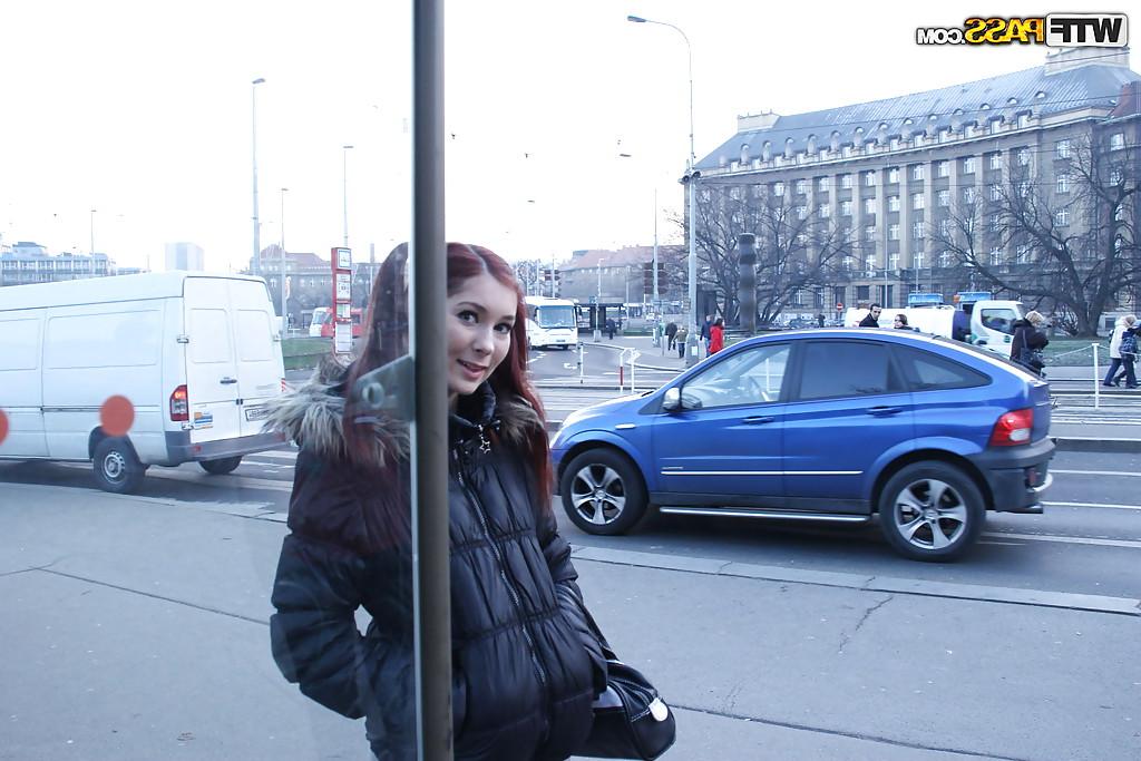 14P Playful redhead babe flashing her shapely titties in a public place