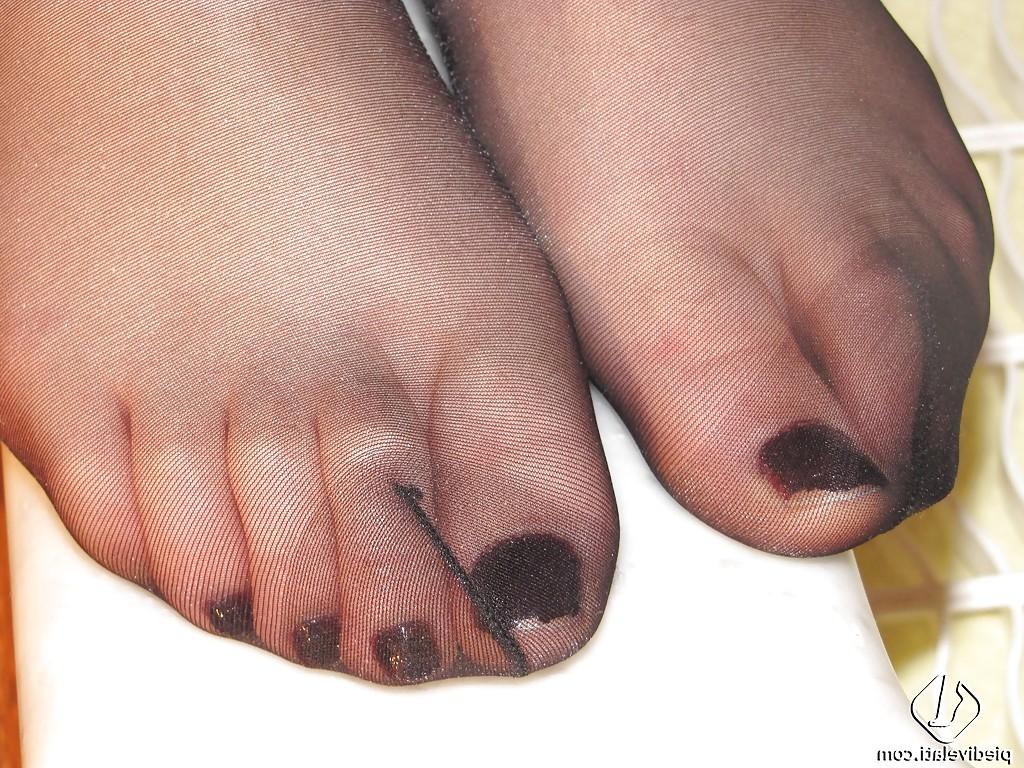 16P Foot fetish girl in glasses Eva showing these magnificent legs