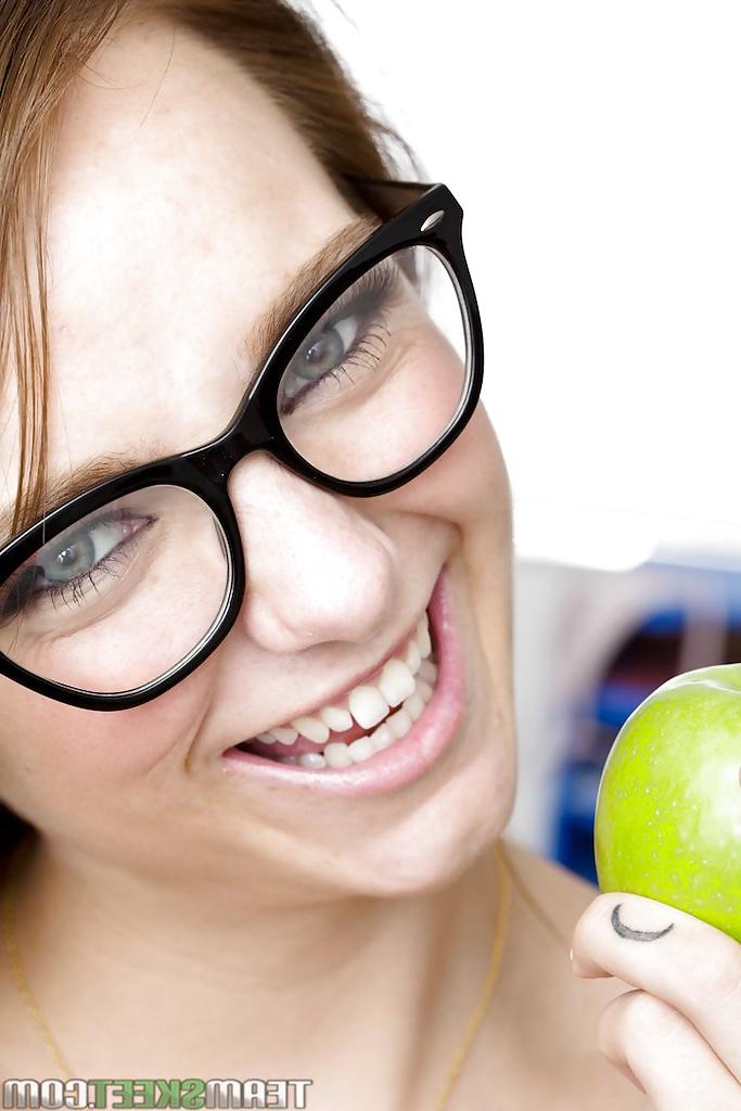 16P Smiley schoolgirl in glasses with petite body gets naked in the classroom