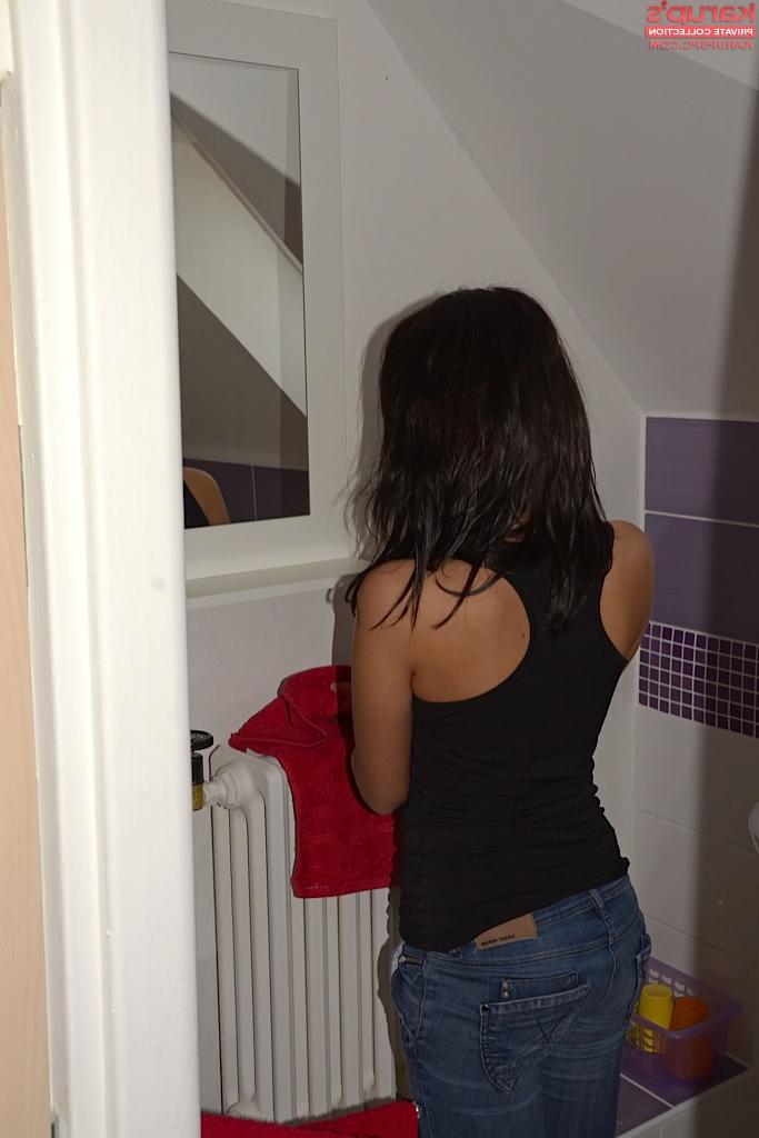 16P Frisky brunette amateur with svelte curves getting naked and taking shower