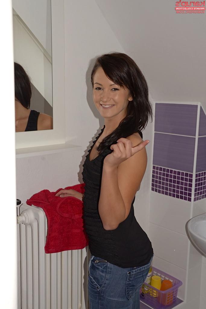 16P Frisky brunette amateur with svelte curves getting naked and taking shower