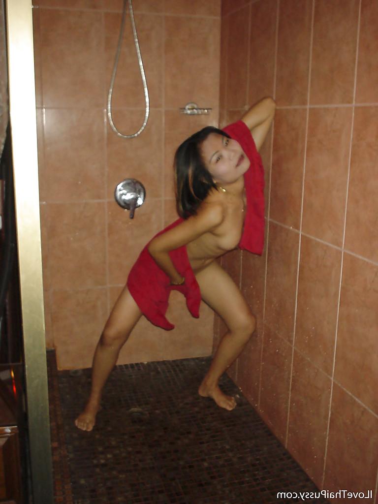 16P Seductive asian teen with tiny tits babe taking a shower and posing naked