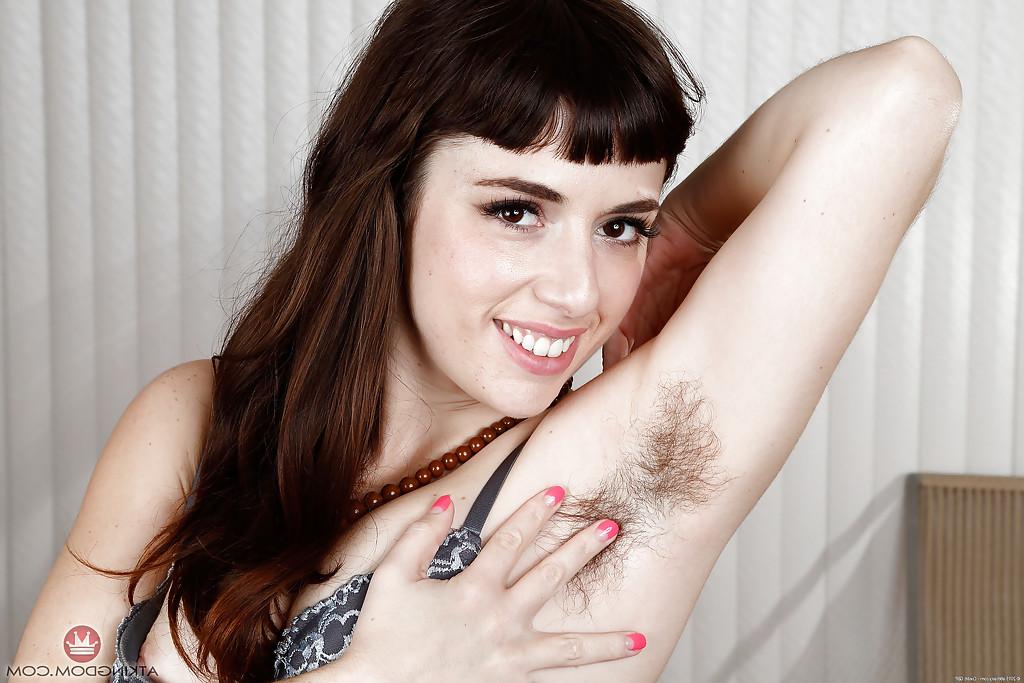 16P Clothed brunette Simone Delilah loosing furry pits and bush from under clothes