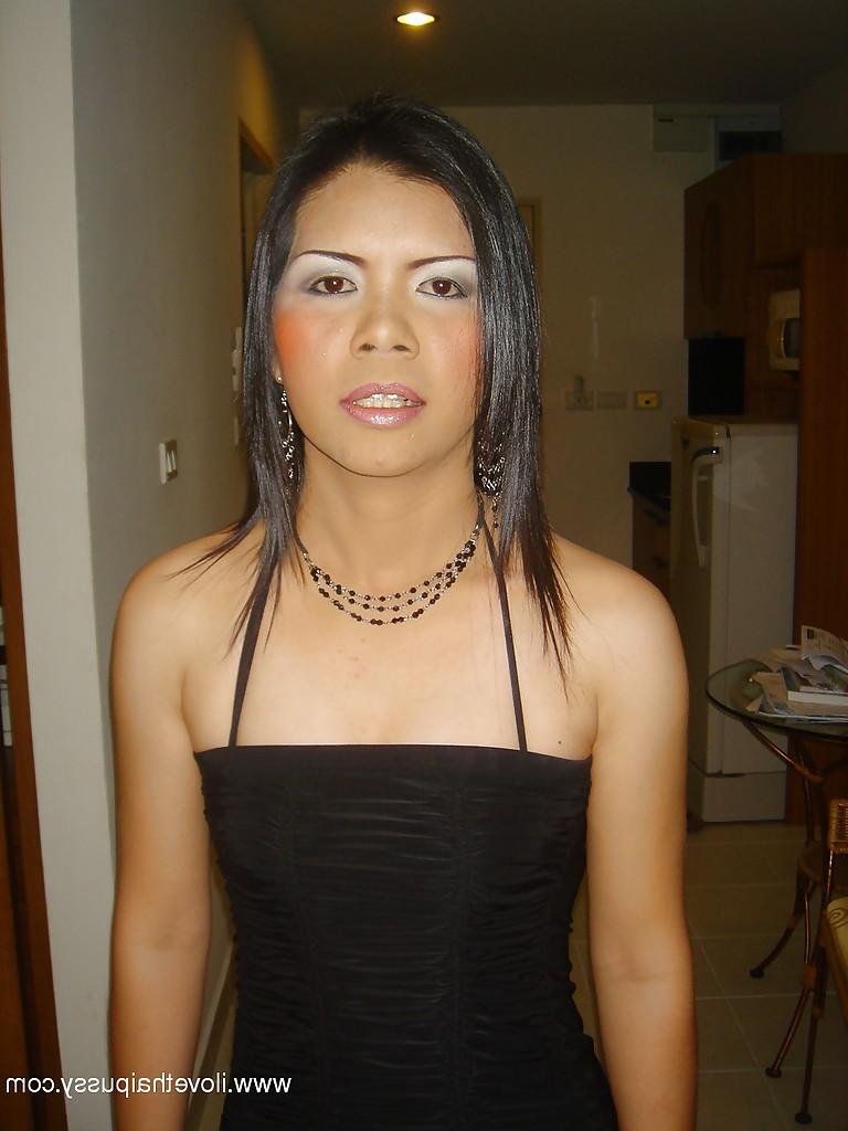 16P Stunning asian babe in black dress showing off her sexy ass and slit