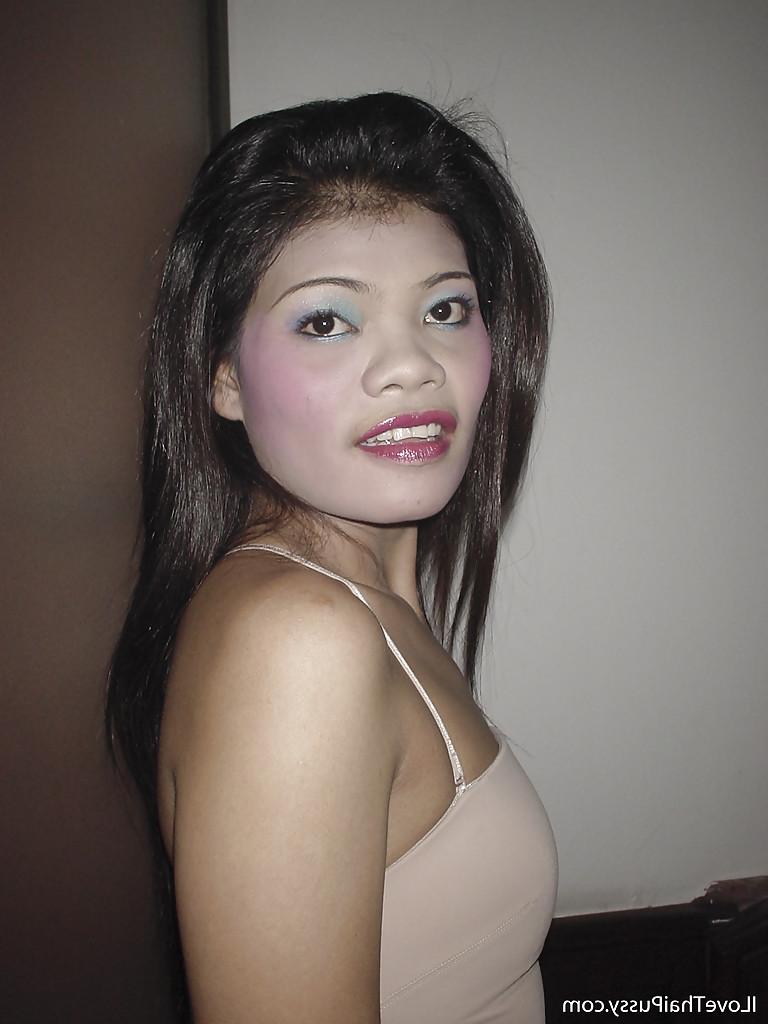 16P Horny asian babe stripping and masturbating her shaved twat in the shower