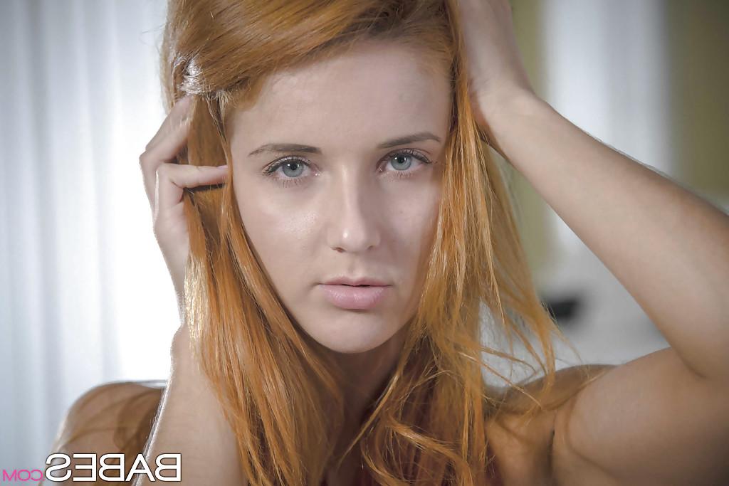 16P Roberta Berti's red hair falls on her tiny tits and shaved twat becomes wet