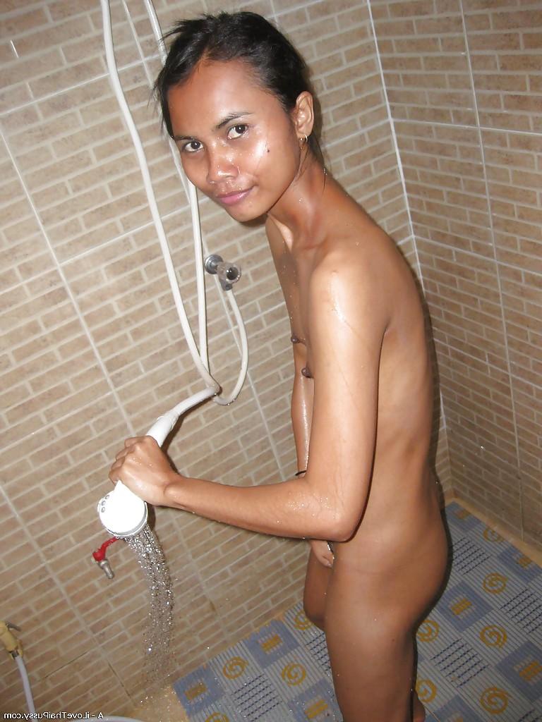 16P Skinny asian babe with tiny tits taking a shower and getting banged