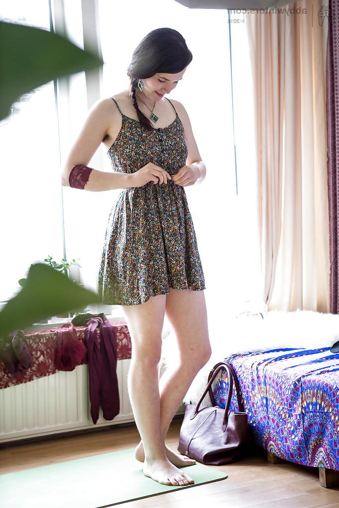 16P Hidden voyeur spies brunette amateur Emilia pulling on panties and dress
