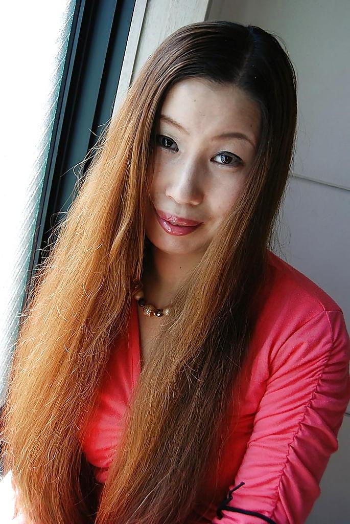 16P Asian MILF Ayako Sakuma undressing and showcasing her juicy cunt in close up