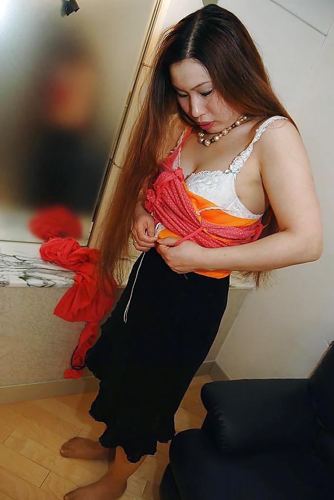 16P Asian MILF Ayako Sakuma undressing and showcasing her juicy cunt in close up