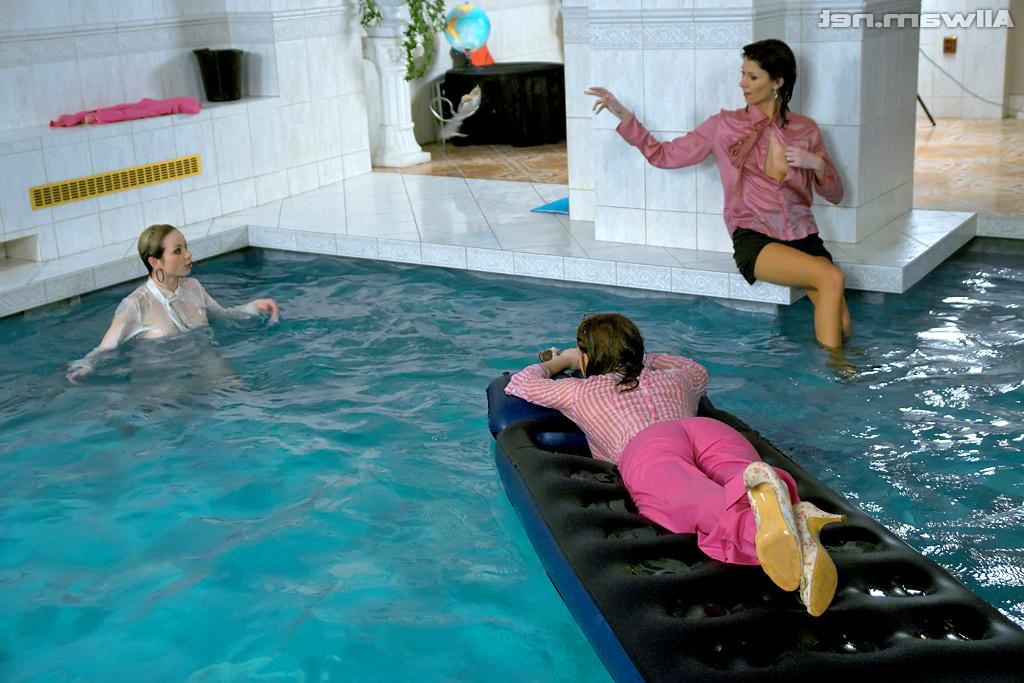 16P Fully clothed fetish ladies having some wet fun in the pool