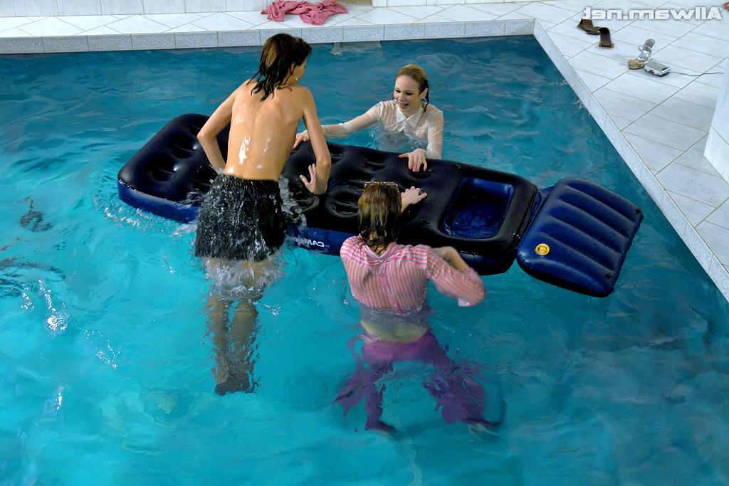 16P Fully clothed fetish ladies having some wet fun in the pool