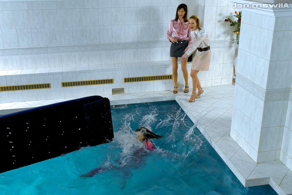 16P Fully clothed fetish ladies having some wet fun in the pool