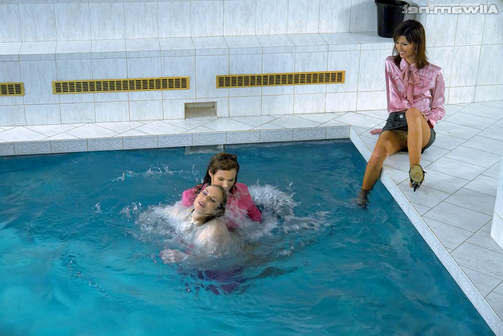 16P Fully clothed fetish ladies having some wet fun in the pool