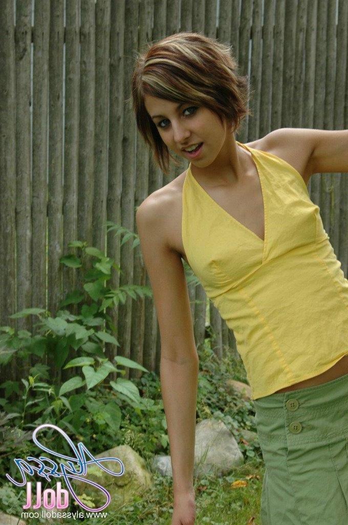16P Pictures of Alyssa Doll exposing her small tits outside