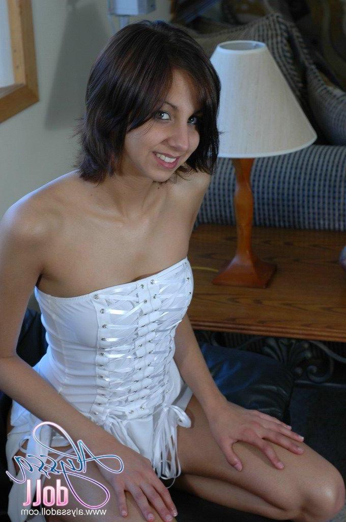 15P Pictures of Alyssa Doll flashing her perky tits