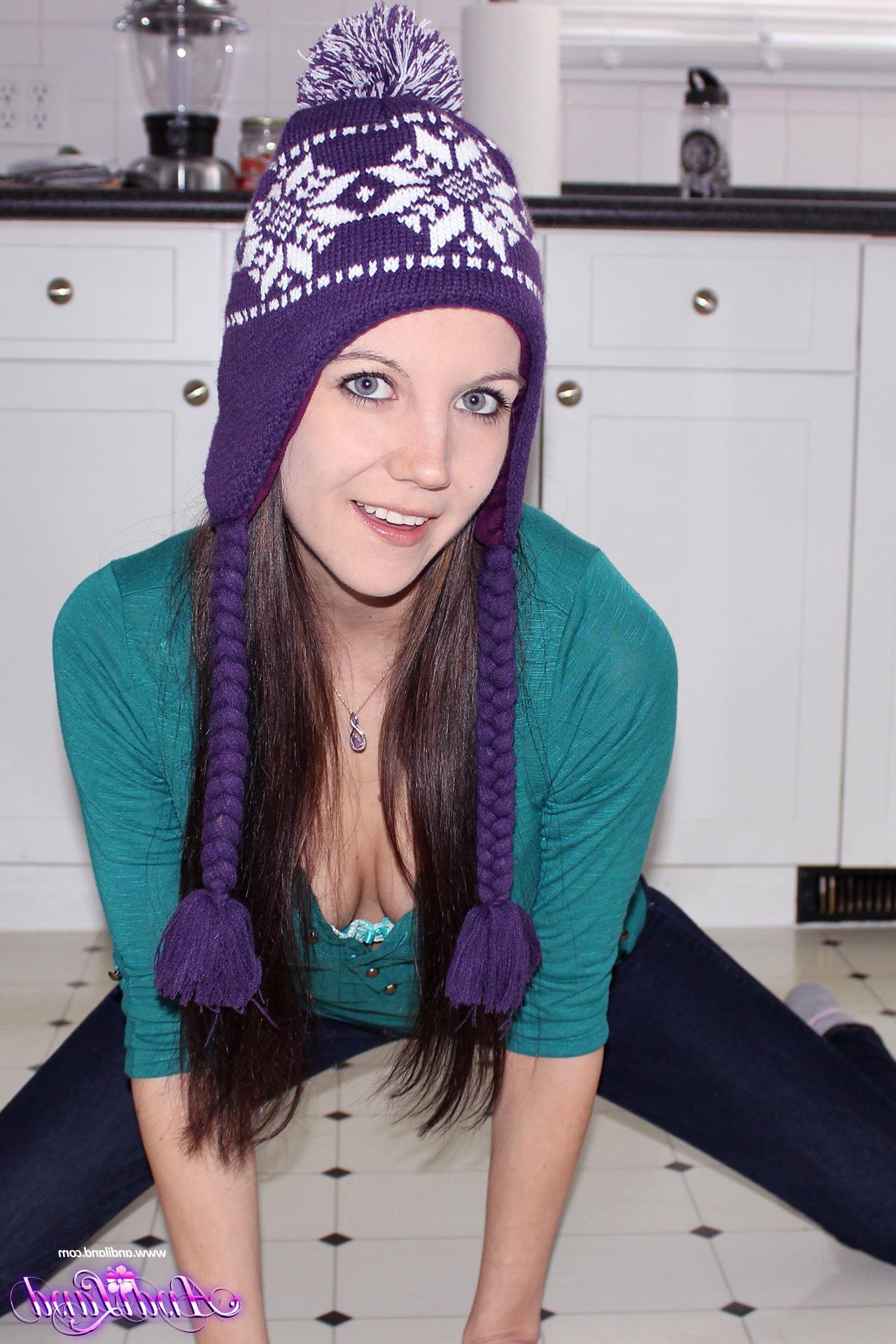 15P Andi Land strips and teases in her winter toque and socks