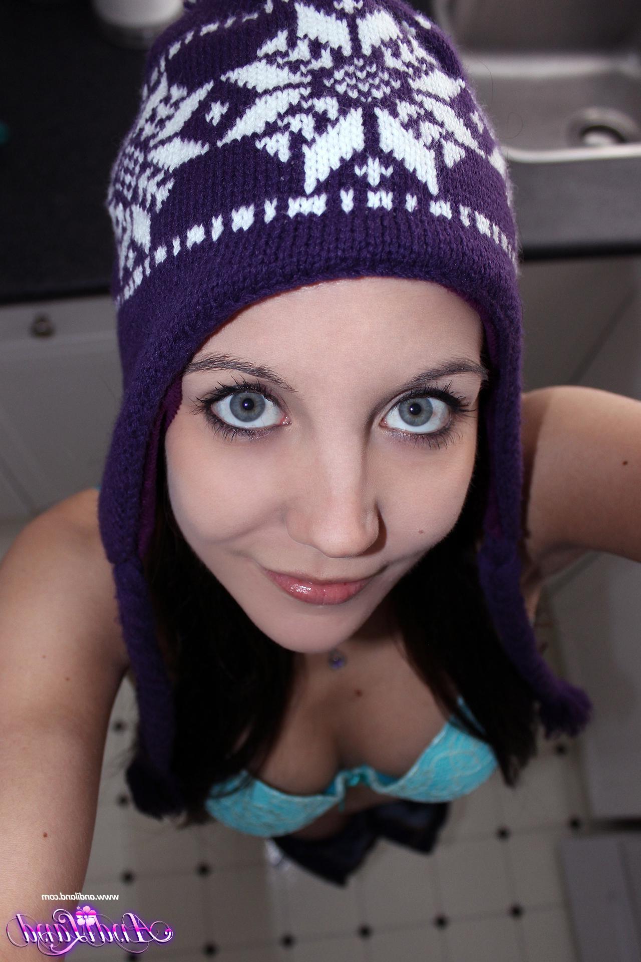15P Andi Land strips and teases in her winter toque and socks