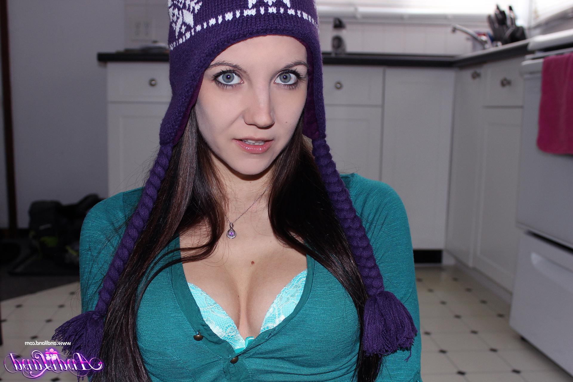 15P Andi Land strips and teases in her winter toque and socks