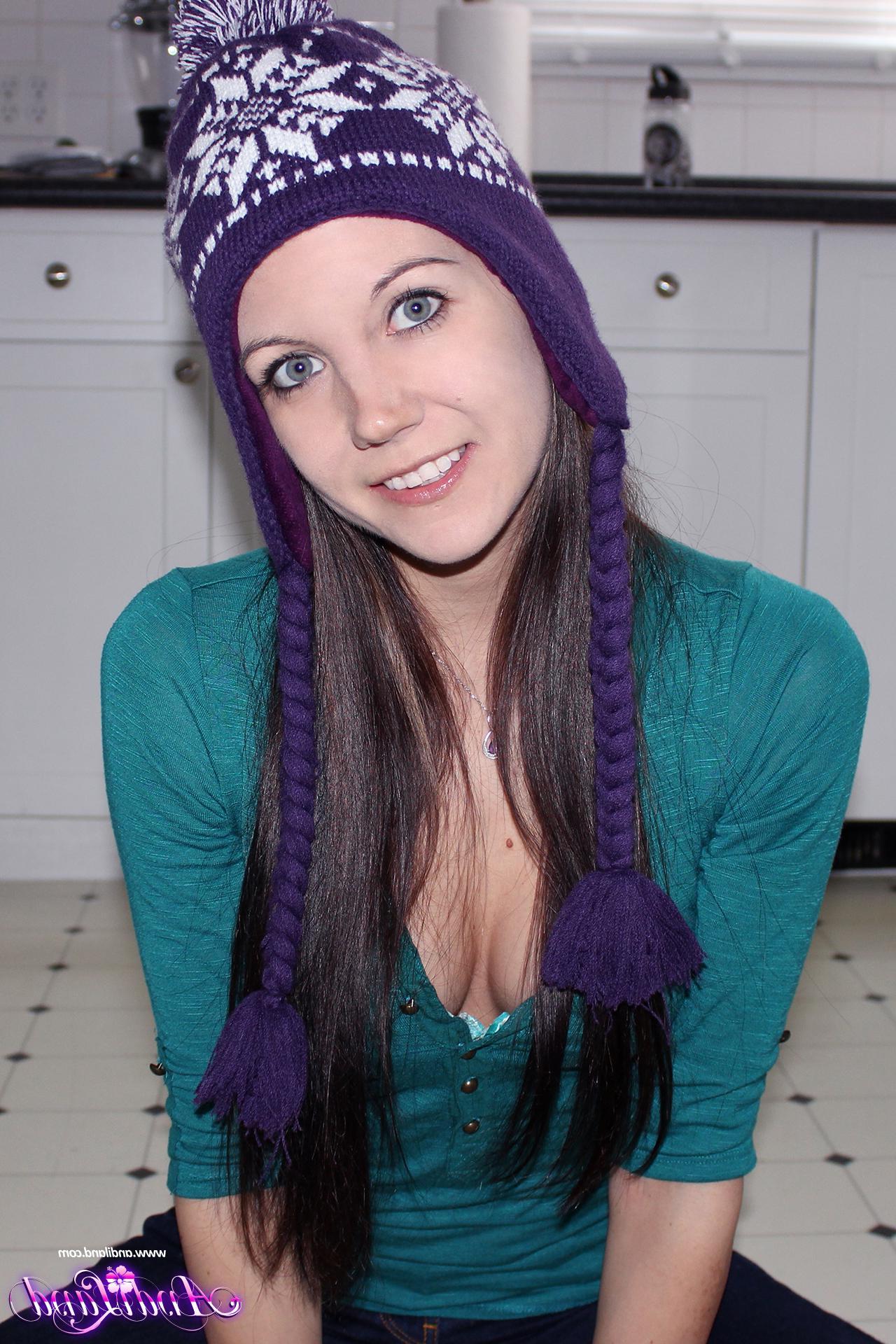 15P Andi Land strips and teases in her winter toque and socks