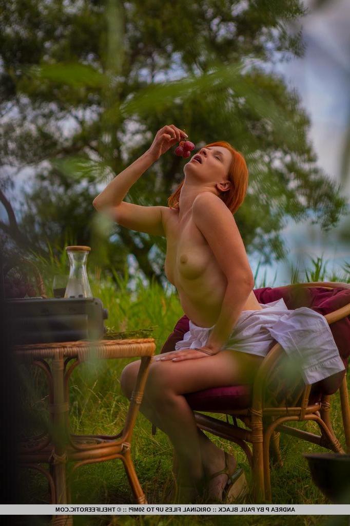 16P Redhead girl Andrea P displays her beautiful nude body outside
