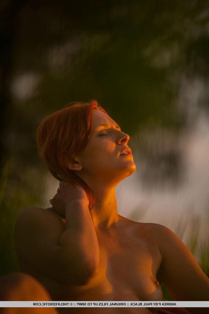16P Redhead girl Andrea P displays her beautiful nude body outside