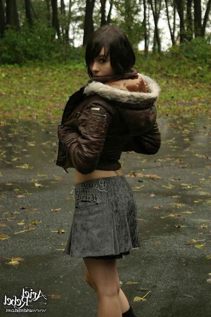 15P Pictures of Ariel Rebel flashing her small tits outside