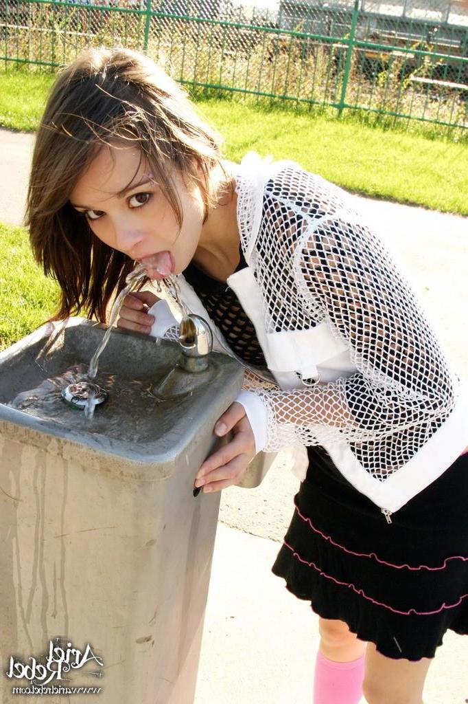 15P Pictures of Ariel Rebel showing you her pussy upskirt in the park