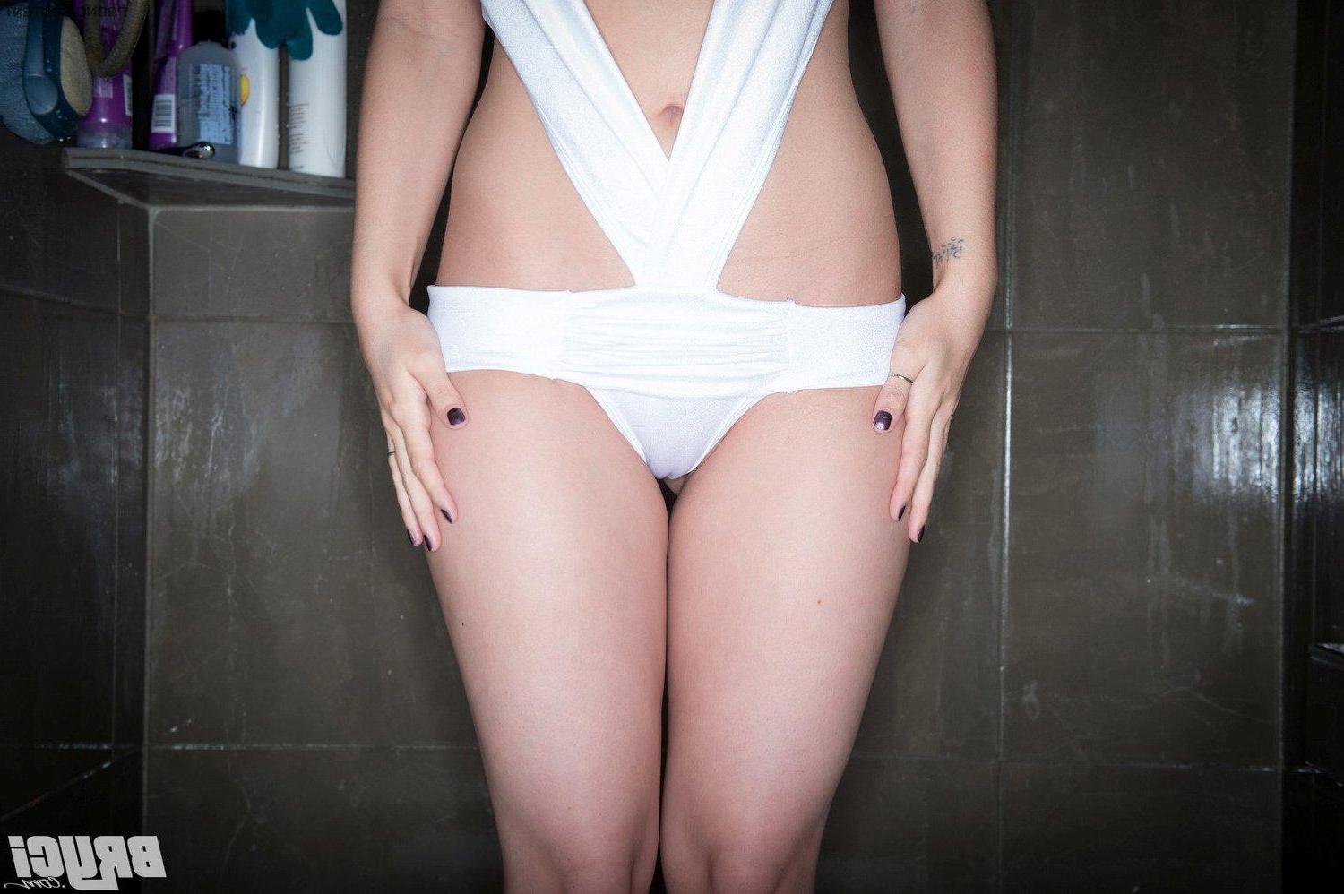 15P Busty brunette model Bryci invites you to join her in the shower