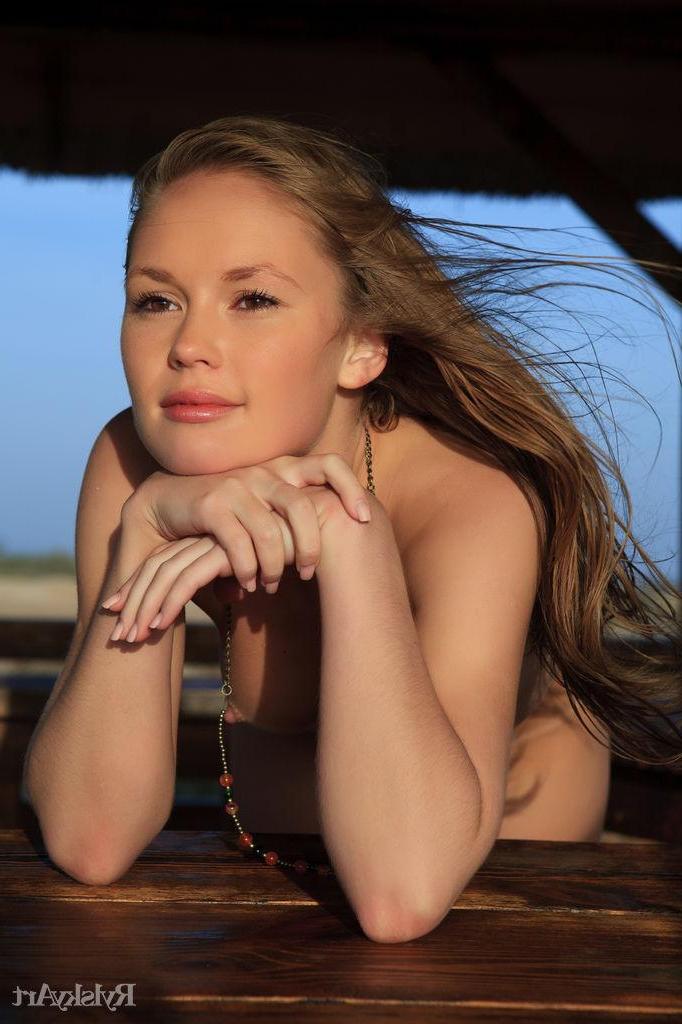 16P Gorgeous blonde Caesaria displays her stunning body on the beach