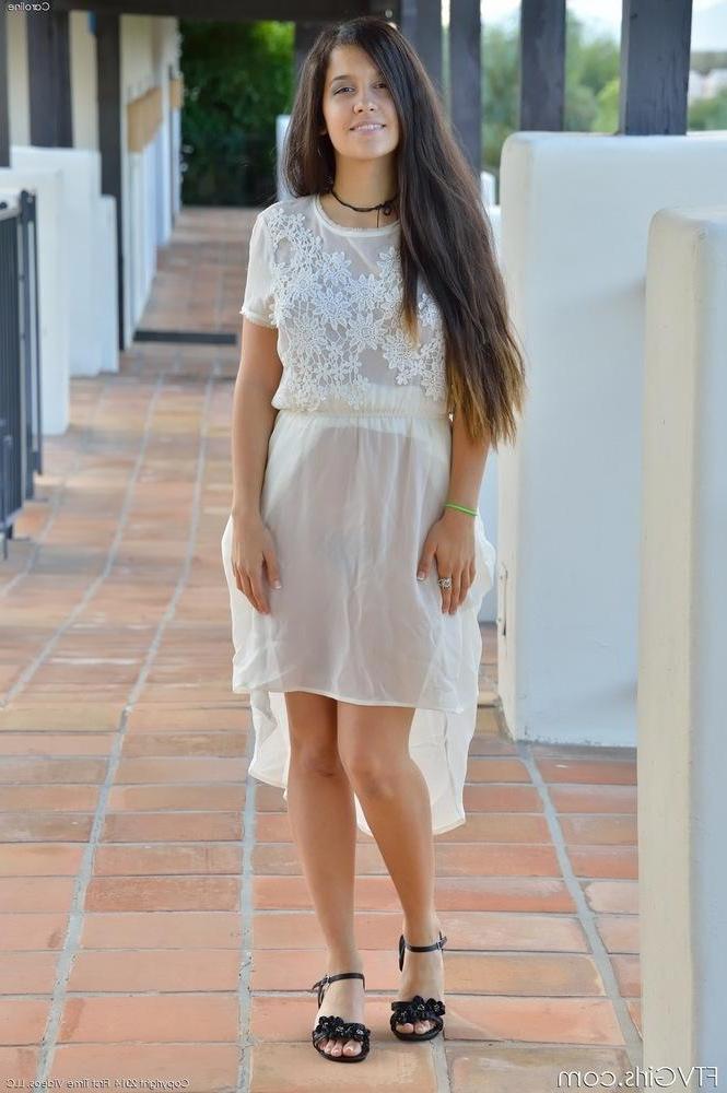 16P Brunette girl Caroline strips off her white dress and toys her hairy pussy