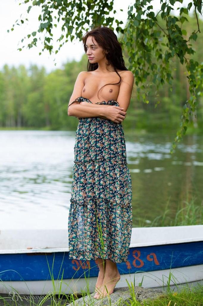 16P Brunette teen Dominika Dark gets naked by the lake in "Mermaid"