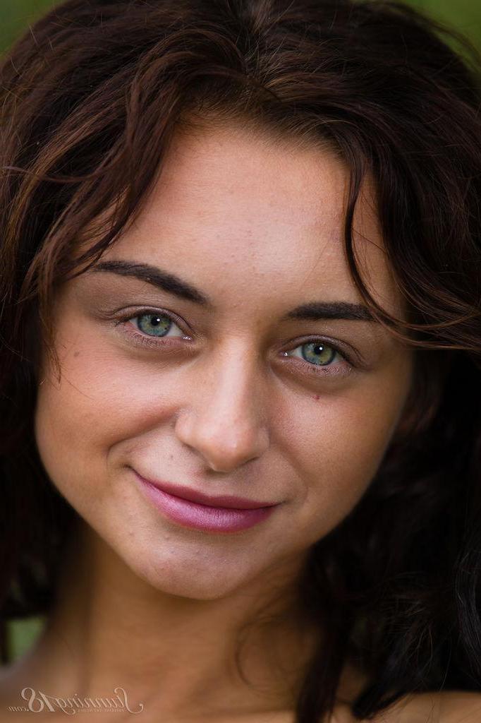 16P Brunette teen Dominika Dark gets naked by the lake in "Mermaid"