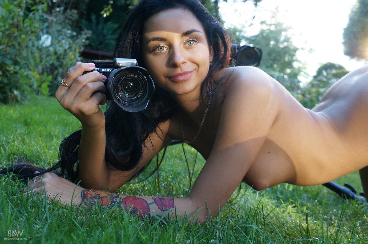 16P Brunette hottie Inga has some fun with a camera outside