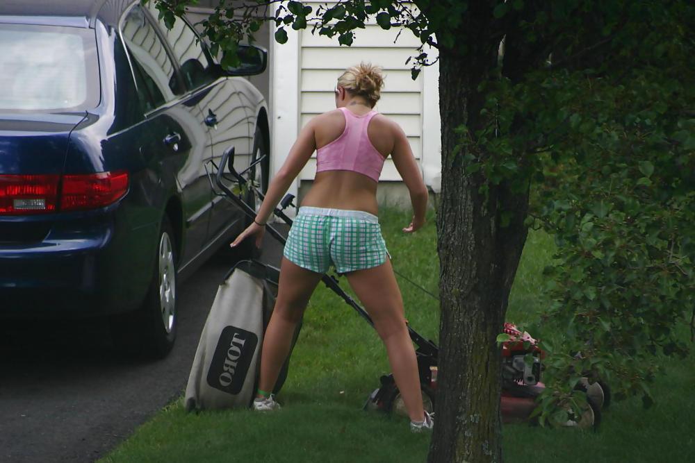7P Neighbor mowing her lawn