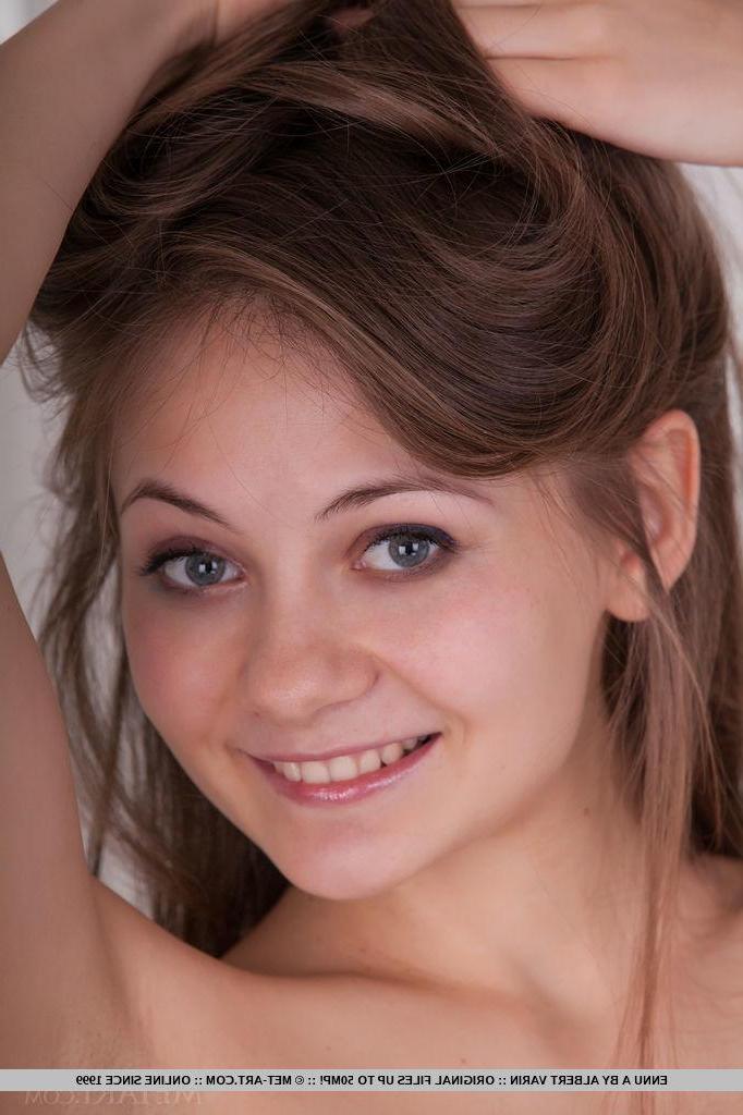 18P Brunette girl Ennu A strips nude to show off her fuzzy lady parts