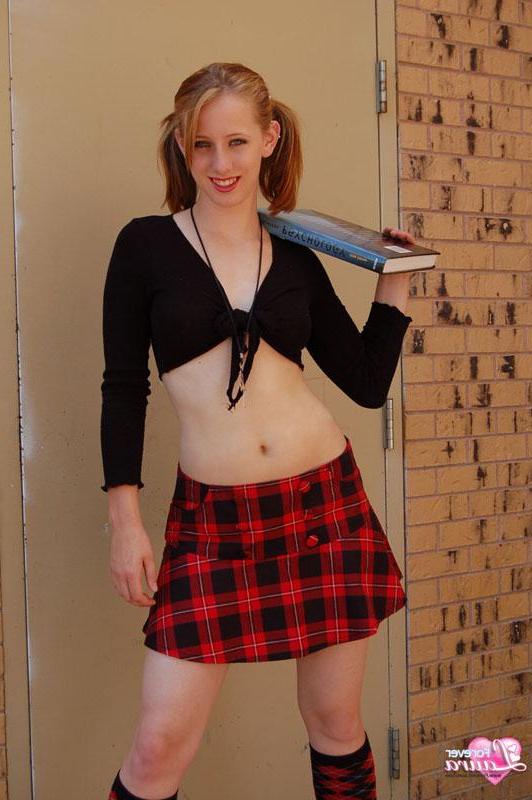 16P Pictures of redhead teen schoolgirl Forever Laura showing you up her skirt