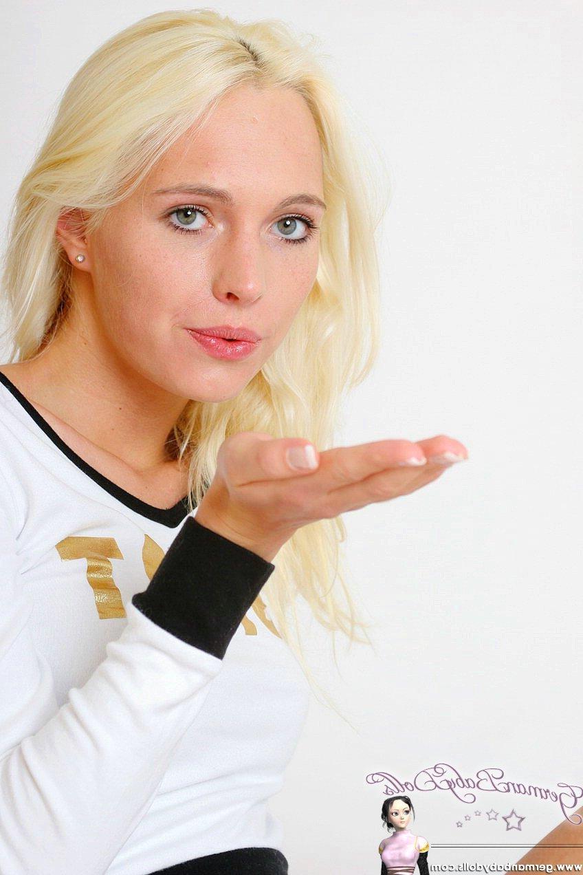 16P Pictures of hot blonde teen Allizee in golden hotpants and sexy shirt