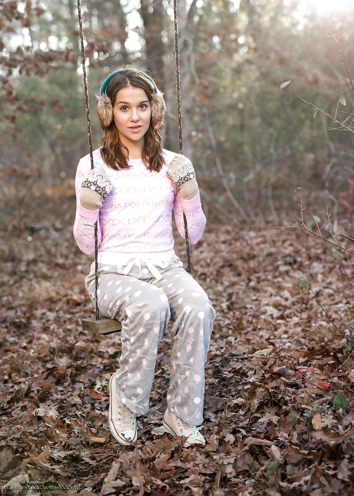 16P Solo girl Kasey Warner undressing for nude shoot outdoors in woods clearing
