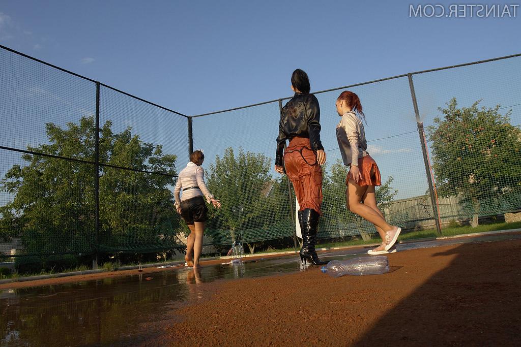16P Seductive fully clothed fetish babes having some wet fun outdoor