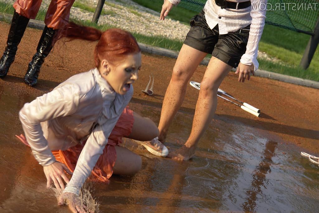 16P Seductive fully clothed fetish babes having some wet fun outdoor