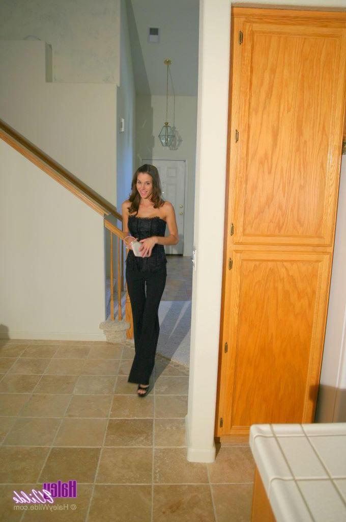 20P Pictures of Haley Wilde stripping in the kitchen