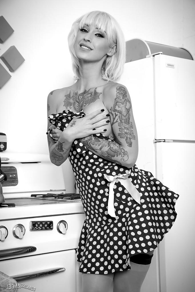 16P Tattooed fetish model models stockings and heels for black and white photos