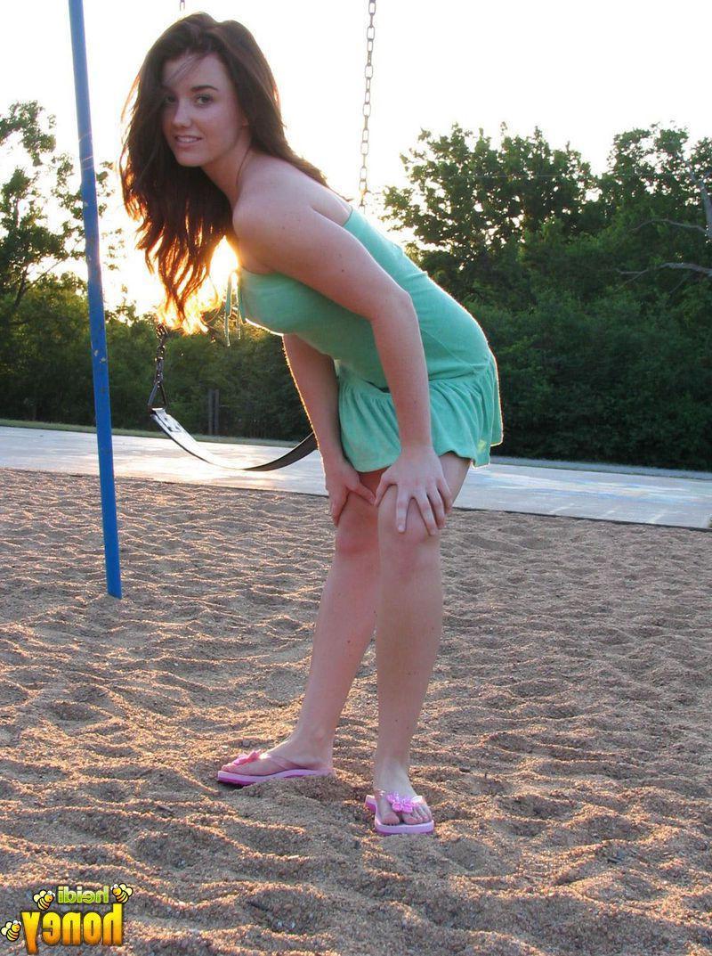 20P Pictures of Heidi being naughty in a park