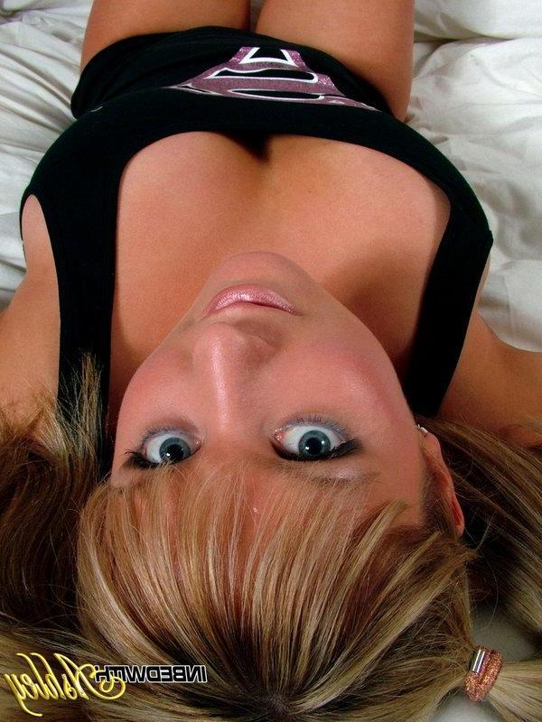 15P Pictures of In Bed With Ashley strutting her stuff in pigtails