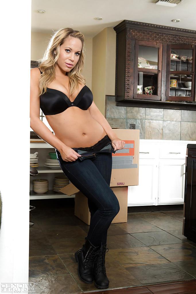 12P Blonde solo girl Olivia Austin exposing large pornstar breasts in kitchen