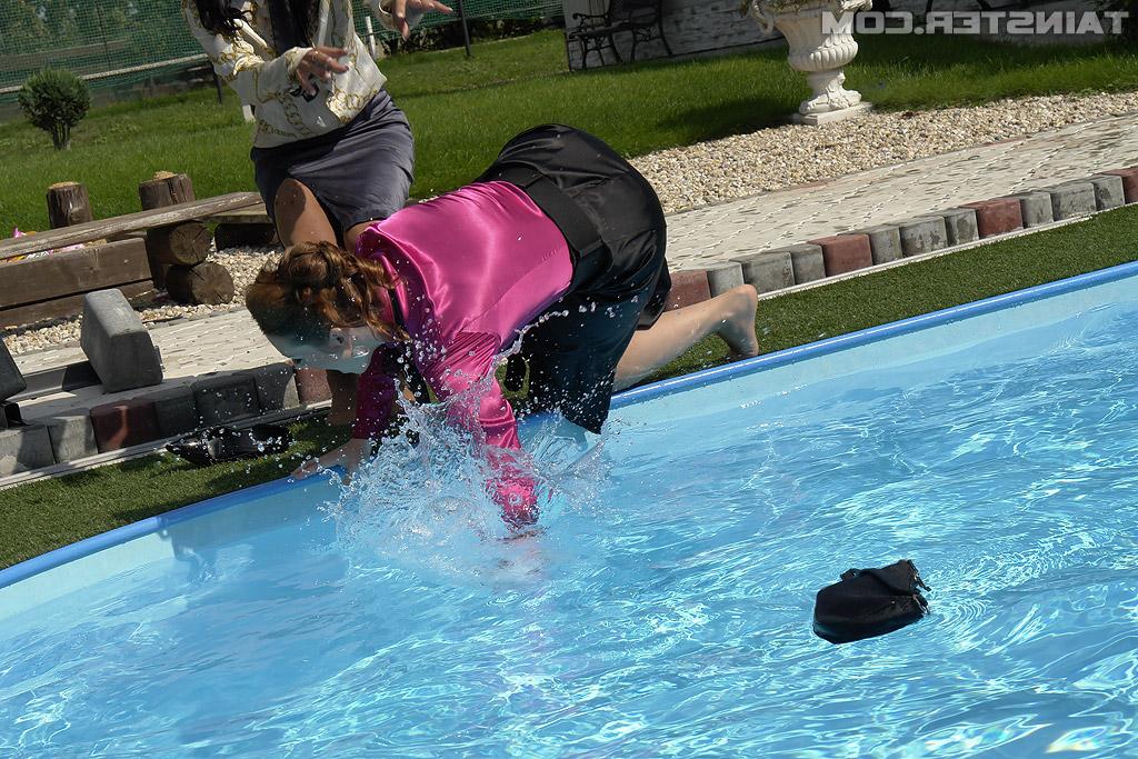 16P Playful fetish ladies have some wet fully clothed pool fun