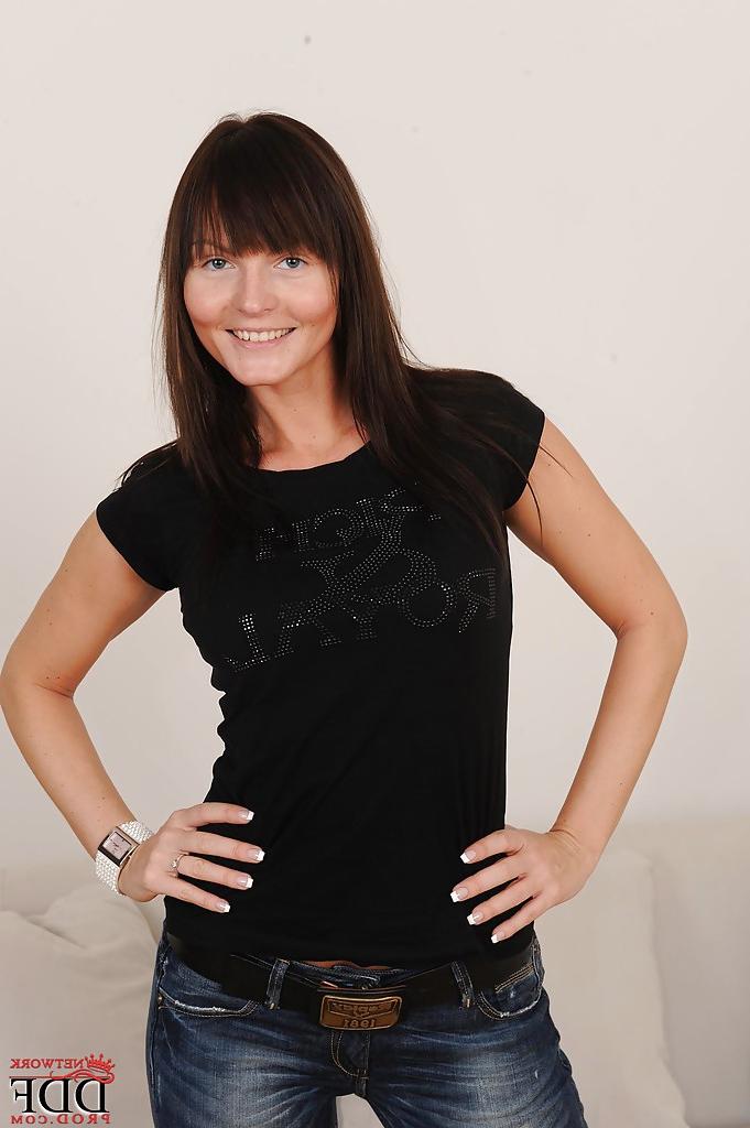 16P Smiley brunette with graceful curves undressing and exposing her goods