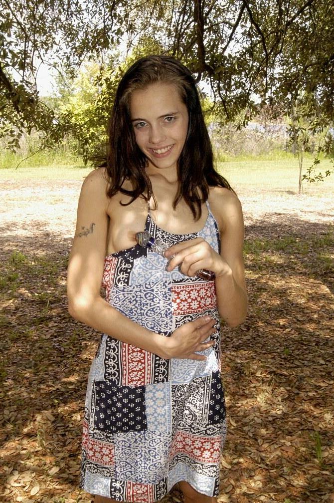 16P Pictures of Jenny Heart being naughty outside
