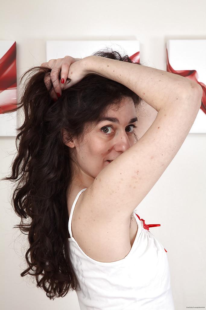 16P Ugly hairy pussy by mature brunette with hairy armpits and tiny tits.